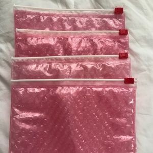4 New and/or Gently Used Glossier Pink Bubble Bags/Pouches